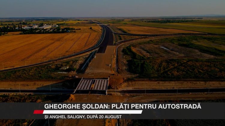 Vedere aeriană a unui șantier de autostradă, cu porțiuni de drum asfaltate și neasfaltate.