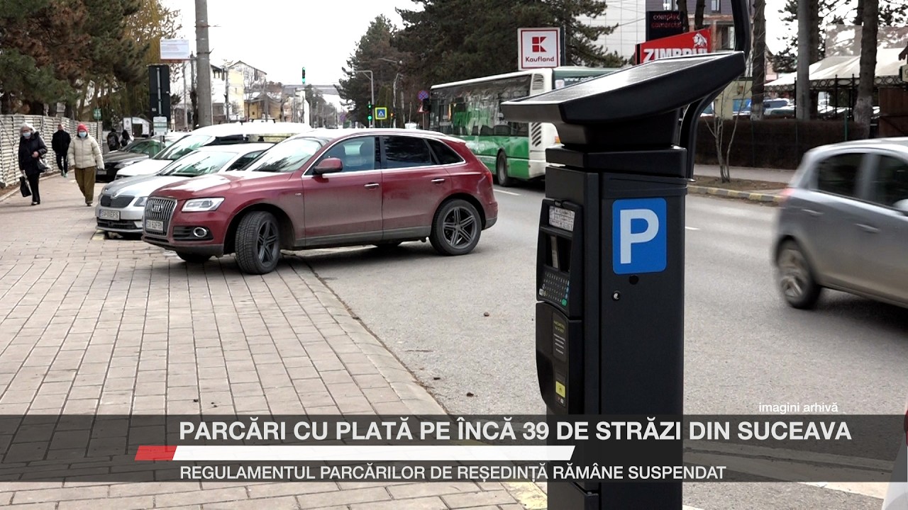 Parcare auto cu mașini și bariere